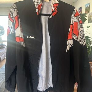 Black and Red Bomber Jacket with Abstract Accents